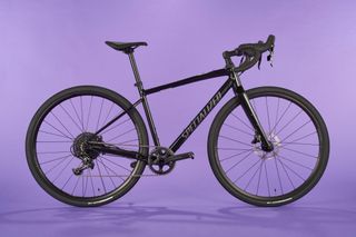 Specialized Diverge Comp E5 on a purple background