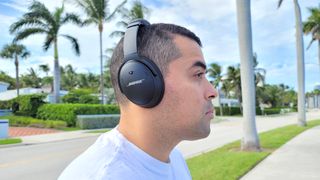 Our reviewer wearing the Bose QuietComfort 45