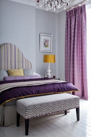 lilac bedroom with purple and yellow accents
