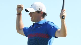 Rory McIlroy celebrates winning the 2013 Australian Open