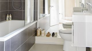 compact bathroom design with mirror wall to add depth