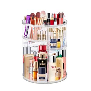 A spinning makeup organizer with makeup on it