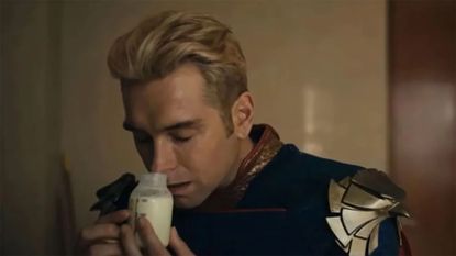 Homelander hungrily smelling a jar of breast milk