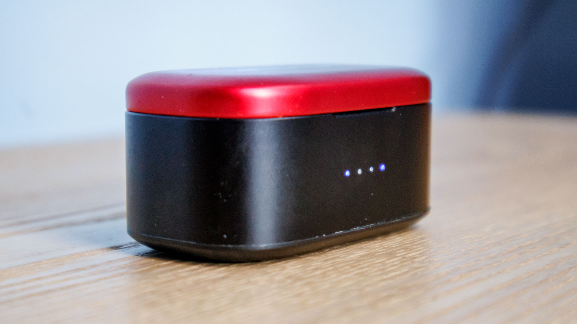 Noble Fokus Amadeus on a wooden surface, showing the front of the case