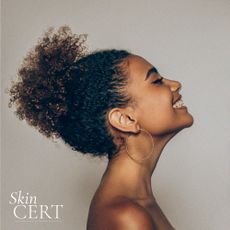 Model with Afro hair and smooth skin