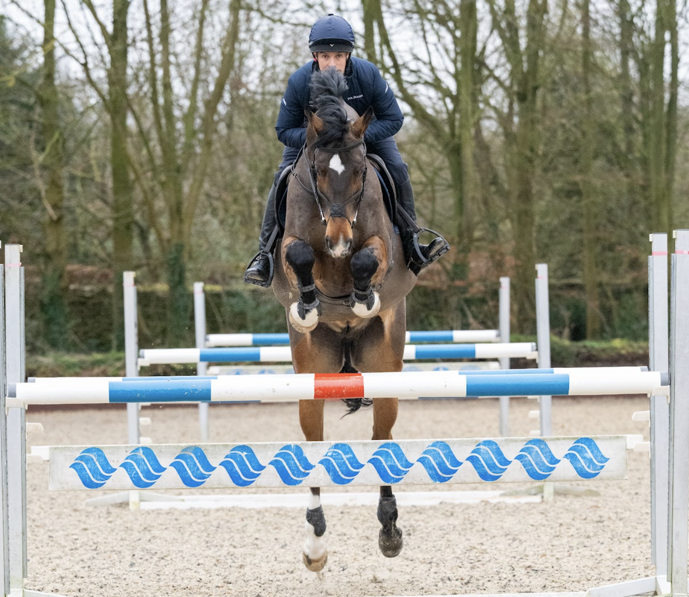 Harry Meade jumping a grid