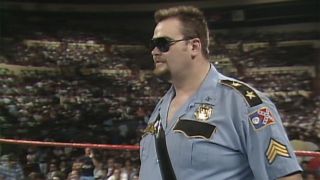 Big Boss Man in costume in the ring.