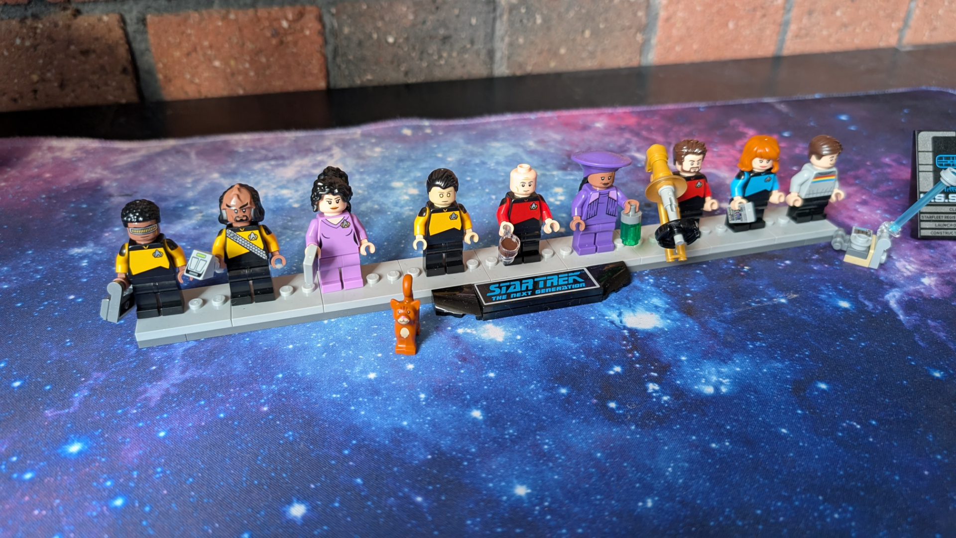 Lego U.S.S. Enterprise minifigures, on a stand