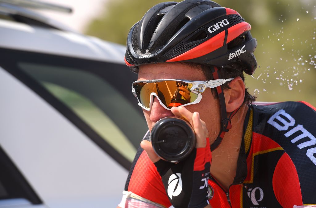 BMC's Greg Van Avermaet takes a drink in the hot weather