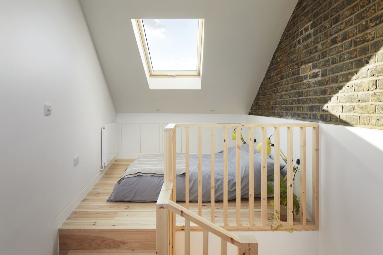 a bedroom in a narrow infill house