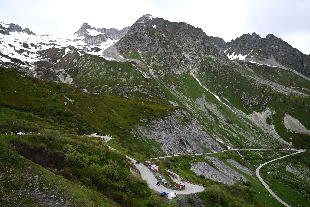 COL DE LA CROIX DE FER FRANCE JUNE 10 A general view of the peloton climbing to the Col de la Madeleine 1993m during the 75th Criterium du Dauphine 2023 Stage 7 a 1479km stage from PortedeSavoie to Col de la Croix de Fer 2067m UCIWT on June 10 2023 in Col de la Croix de Fer France Photo by Dario BelingheriGetty Images