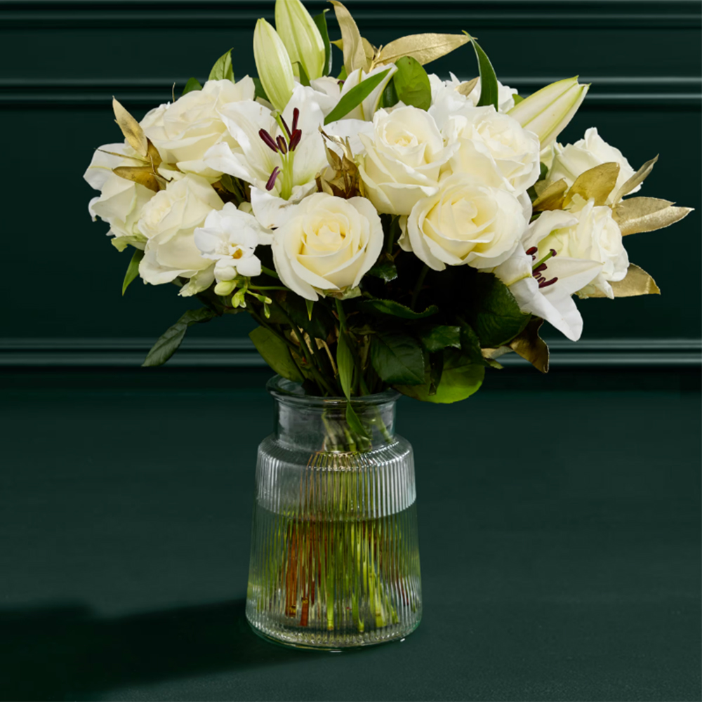 White flower bouquet in glass vase