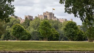 Windsor Castle and Home Park are pictured from the river Thames on 10 July 2023 in Windsor