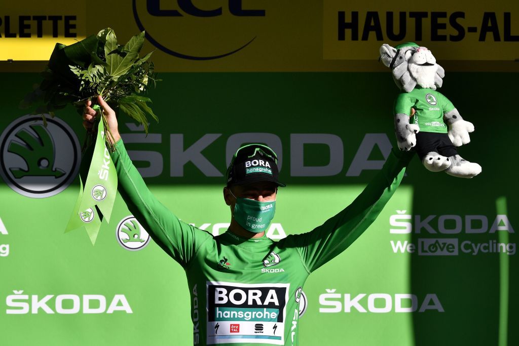 Team Bora rider Slovakias Peter Sagan celebrates his best sprinters green jersey on the podium after the 4th stage of the 107th edition of the Tour de France cycling race 157 km between Sisteron and OrcieresMerlette on September 1 2020 Photo by AnneChristine POUJOULAT AFP Photo by ANNECHRISTINE POUJOULATAFP via Getty Images