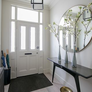 entrance hall with white door