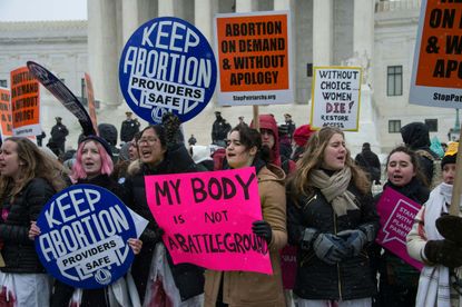 Abortion activists outside the Supreme Court