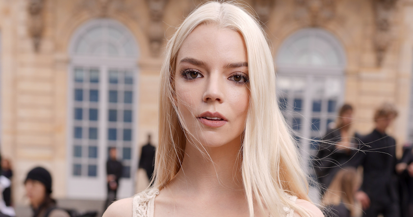 Anya Taylor-Joy at Christian Dior RTW Spring 2025 as part of Paris Ready to Wear Fashion Week held at Musée Rodin on September 24, 2024 in Paris, France wearing a crochet crop top and sheer skirt