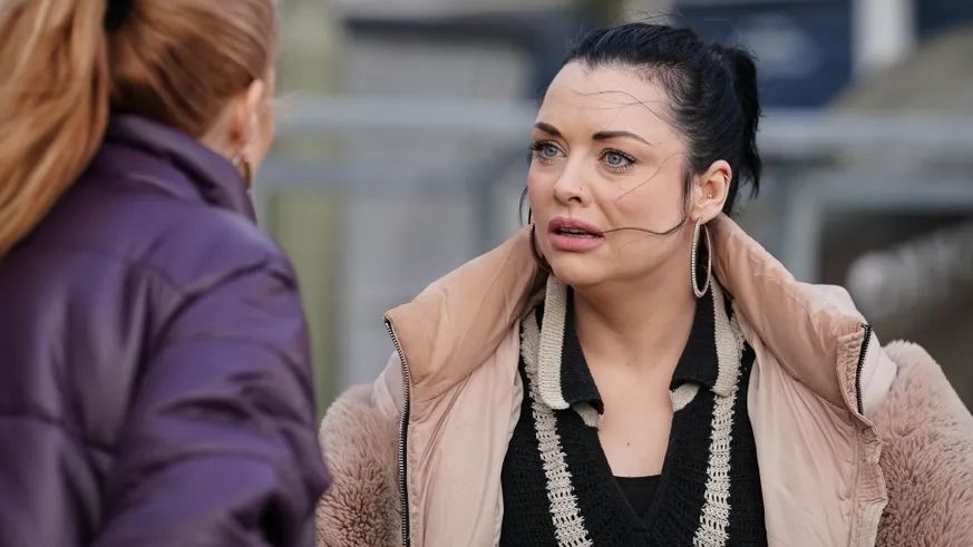 Whitney Dean looks shocked as Bianca Jackson talks to her in EastEnders.