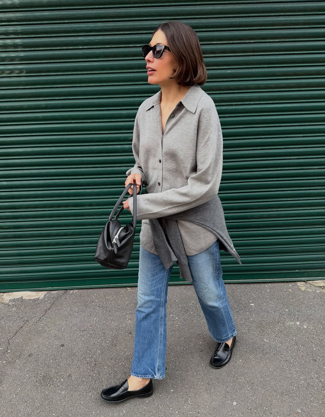 An image of a woman wearing sun faded jeans, a major denim trend 2026.