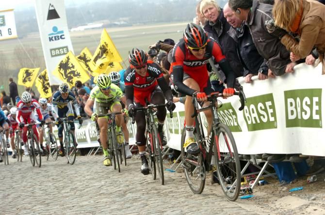 BMC's Marcus Burghardt leads teammate Greg Van Avermaet up the Paterberg.