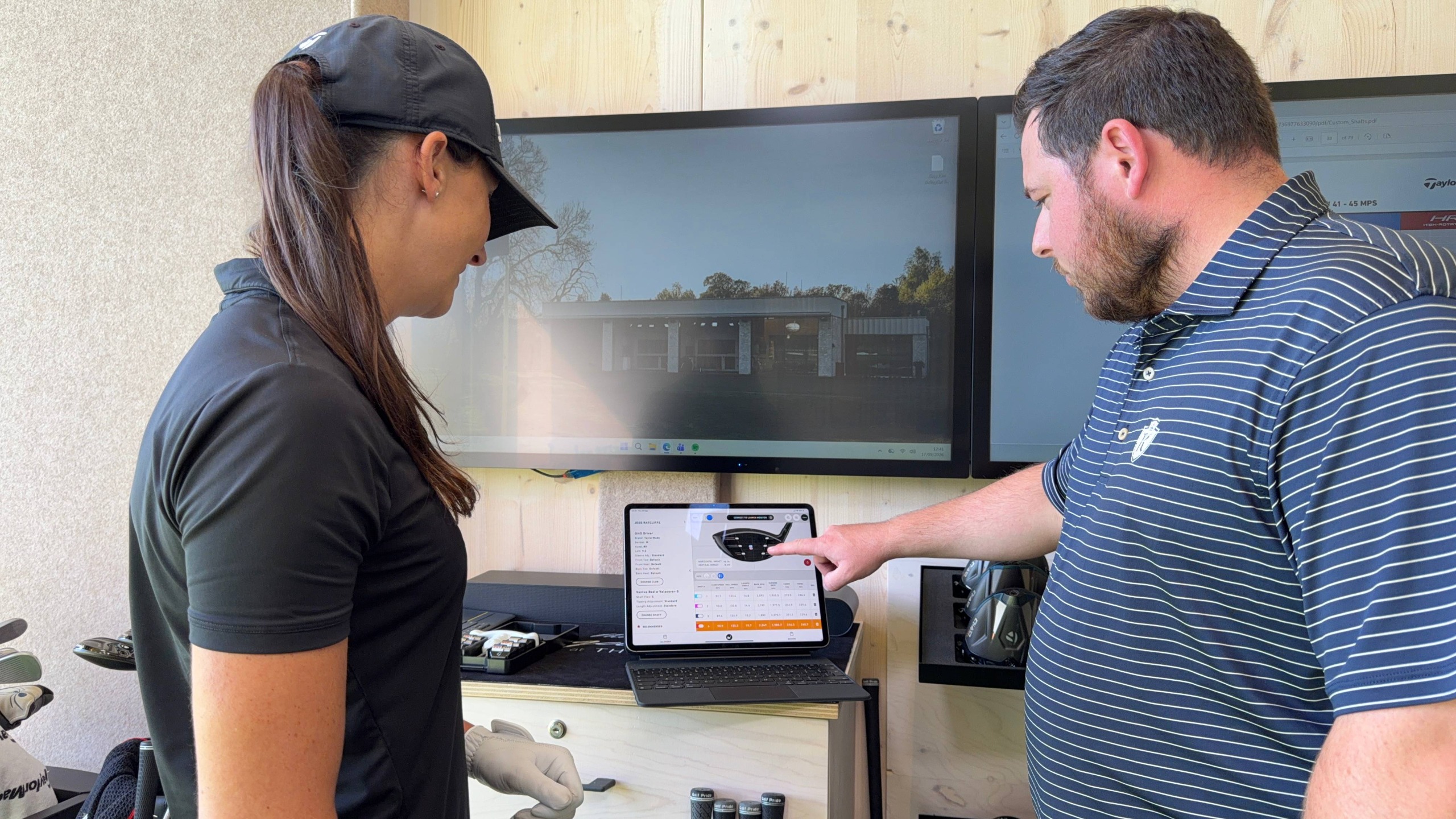 Jess Ratcliffe looking at driver face during a club fitting session