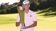 Jacob Bridgeman with the Genesis Invitational trophy 