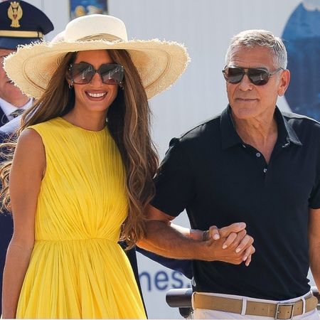 George Clooney and wife Amal are seen arriving at Marco Polo Airport in Venice for the 81st Venice International Film Festival.