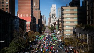 Runners run up First Avenue as seen from the 59th Street Bridge during the 2014 TCS New York City Marathon