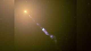 The Hubble Space Telescope sees a jet erupting from the galaxy M87.