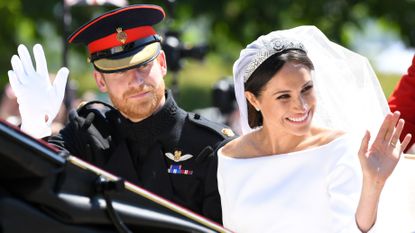 Meghan Markle independence - Prince Harry, Duke of Sussex and Meghan, Duchess of Sussex leave Windsor Castle in the Ascot Landau carriage during a procession after getting married at St Georges Chapel on May 19, 2018 in Windsor, England. Prince Henry Charles Albert David of Wales marries Ms. Meghan Markle in a service at St George's Chapel inside the grounds of Windsor Castle 