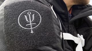 ThruDark Centurion Alpine Jacket: closeup of Velcro logo patch