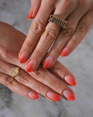 An orange ombre manicure