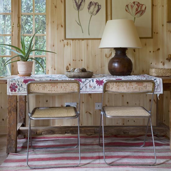 summerhouse living area with 2 chair