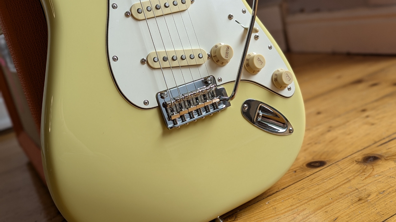 Close up of the pickups and bridge of a Fender Player II Stratocaster