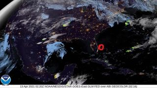 Satellite image of the continental U.S. with a red circle drawn near the Florida coast, indicating the location of a fireball that crossed the sky off the east coast