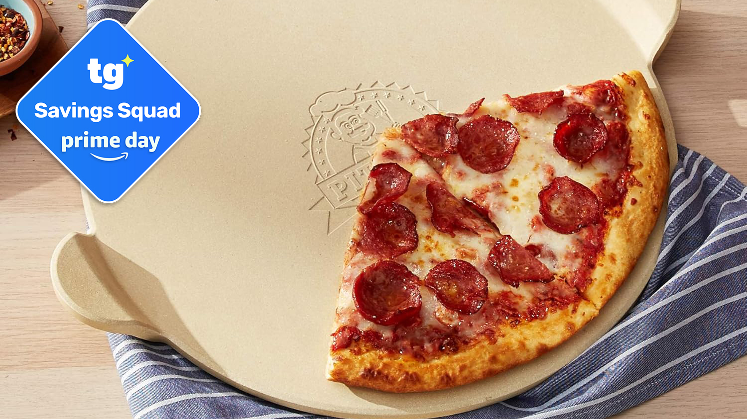Pit Boss Pizza Stone with a pizza on it and a TG prime day badge in the top left