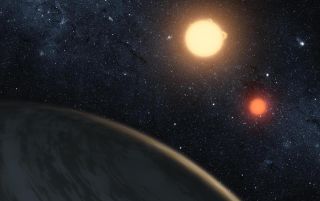 An artist's rendering of Kepler 16-b and its two suns