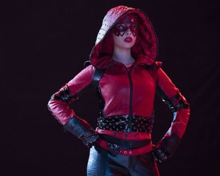 Kylie Cantrall power-poses in a still for the Disney Channel movie Descendants: The Rise of Red. Cantrall portrays the protagonist, named Red.