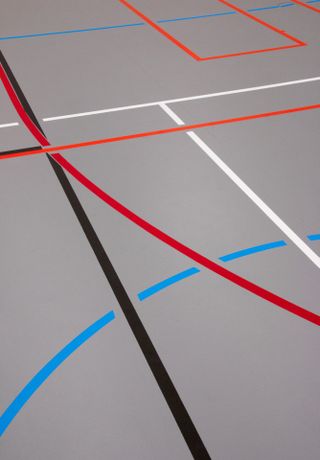 Helsinki Olympic stadium shot by Janne Tuunanen showing graphics on the floor