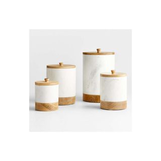 marble and wood kitchen storage cannisters