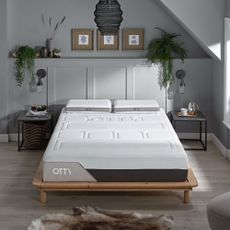 Otty Pure Plus Mattress on bed in grey bedroom