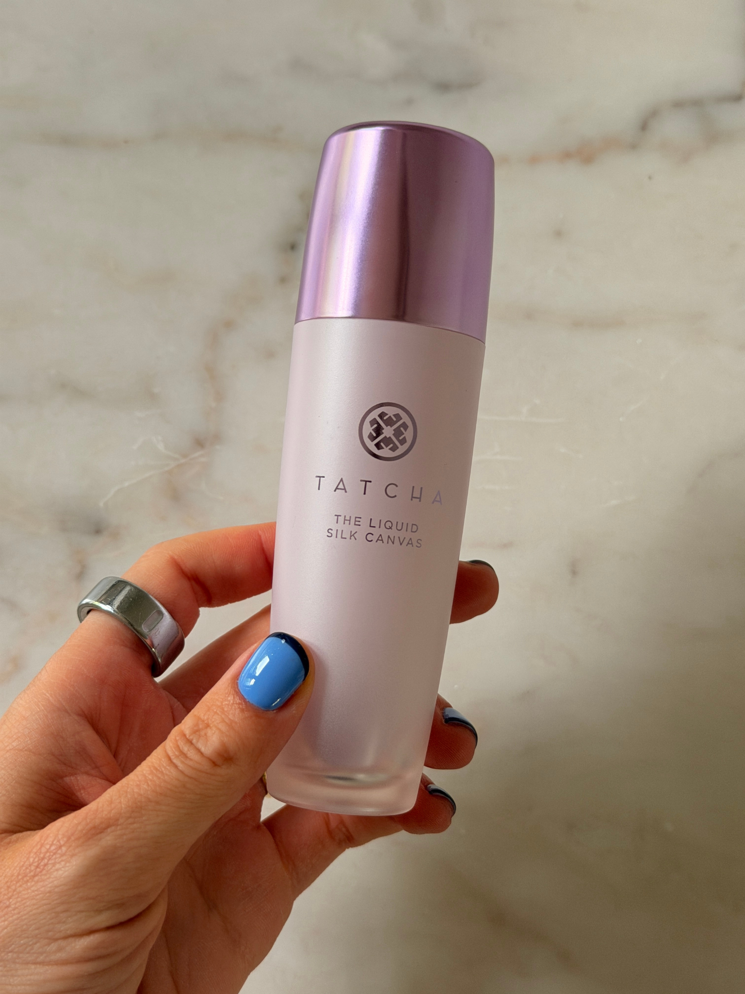 Grace holding the Tatcha primer