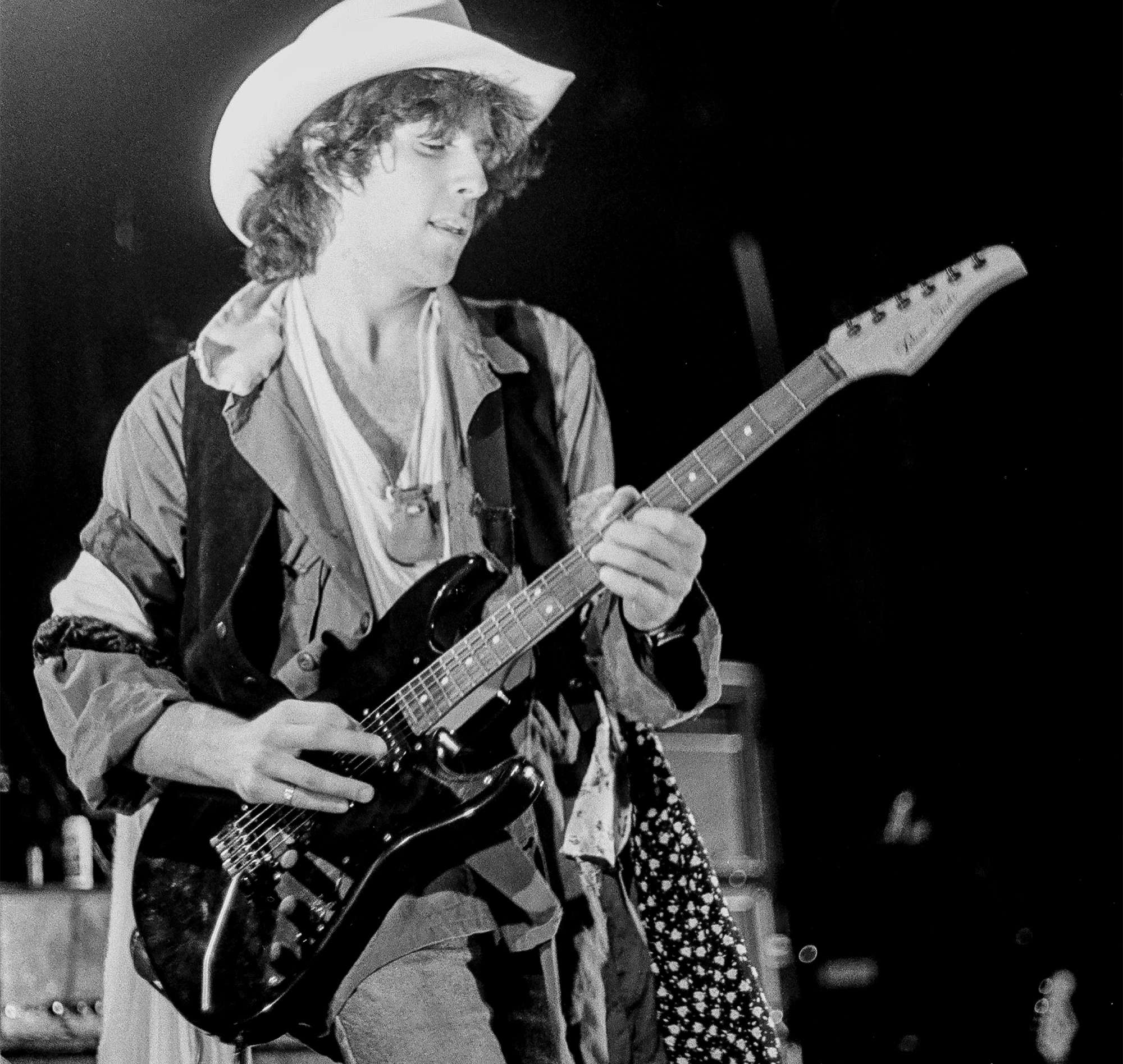 American Rock musician Eric Schenkman, of the group Spin Doctors, plays electric guitar as he performs onstage, during a New Year's Eve concert, at Madison Square Garden's Paramount Theatre, New York, New York, December 31, 1991. The group opened for Blues Traveler.