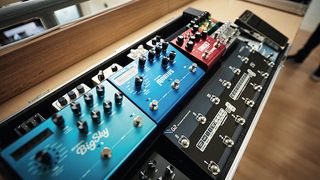 Close-up of a pedalboard feature a Strymon Big Sky and other pedals