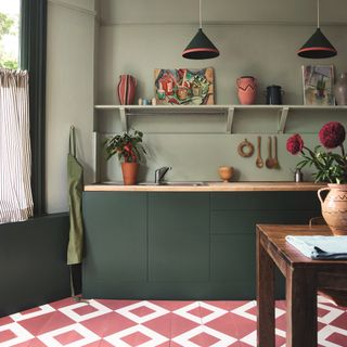 Annie Sloan green kitchen with pink tiled floor