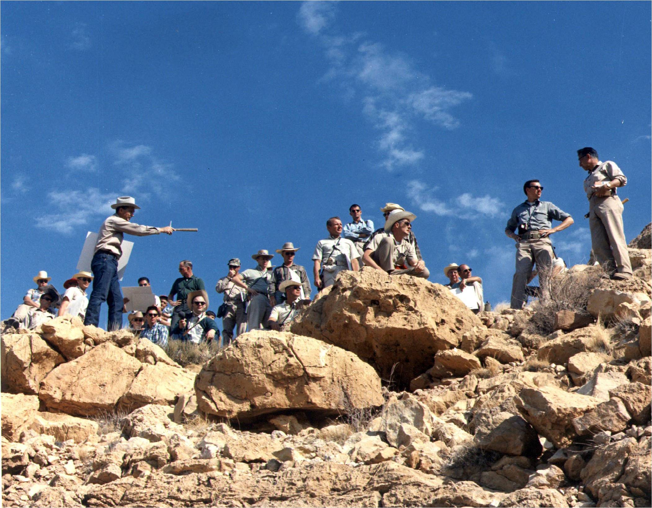 Astrogeologist Gene Shoemaker at Meteor Crater with Apollo astronauts during field trip in May 1967.