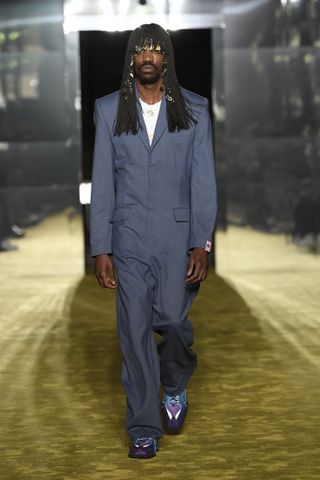 Martine Rose runway show with man in jumpsuit