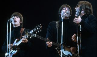 (from left) George Harrison, Paul McCartney and John Lennon perform at Empire Pool in Wembley at the New Musical Express Annual Poll Winner's Concert on May 1, 1966 in London