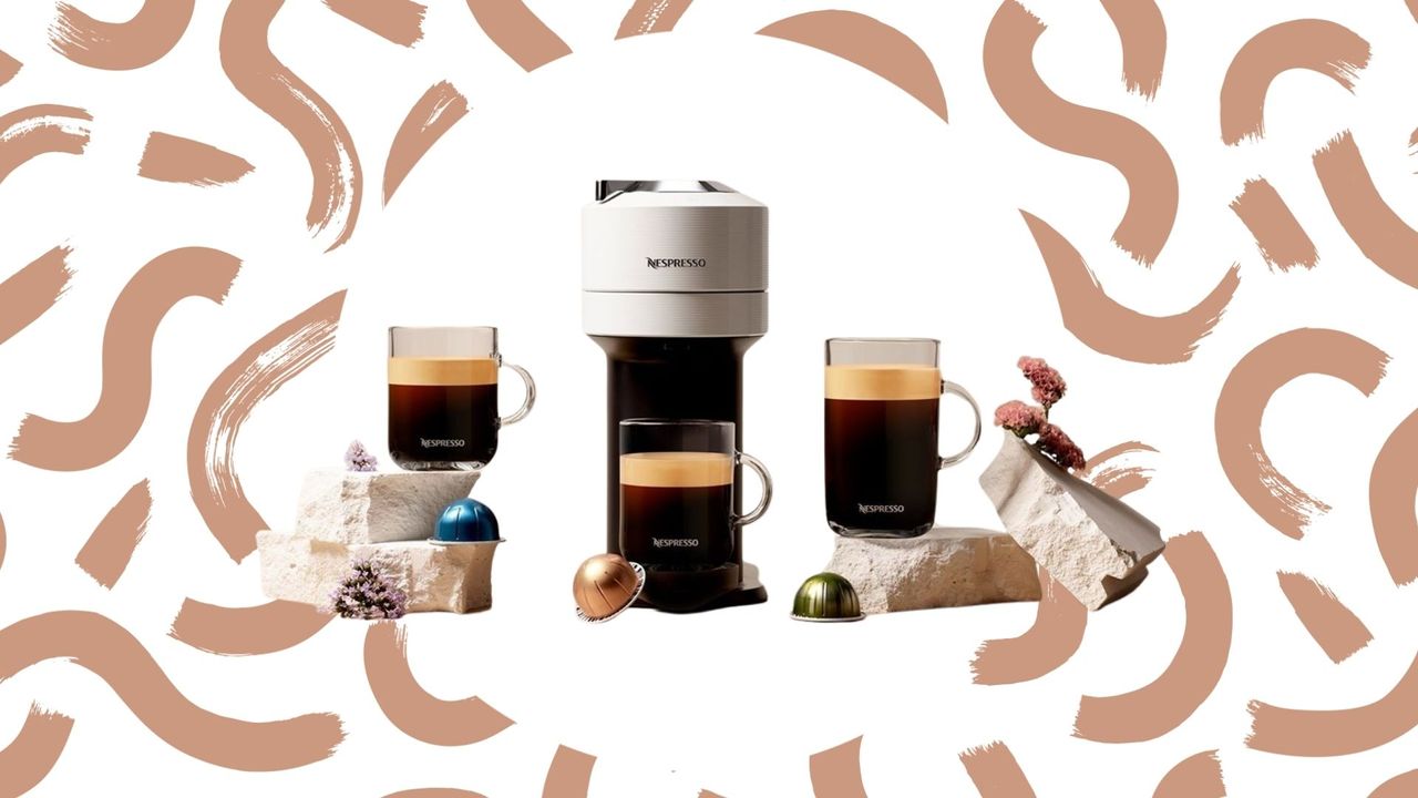 Nespresso Vertuo Next machine with cups against a patterned background