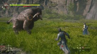 Jill and Clive battle a bighorn in Final Fantasy 16